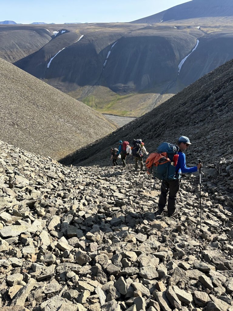 Descending a steep, rocky hill