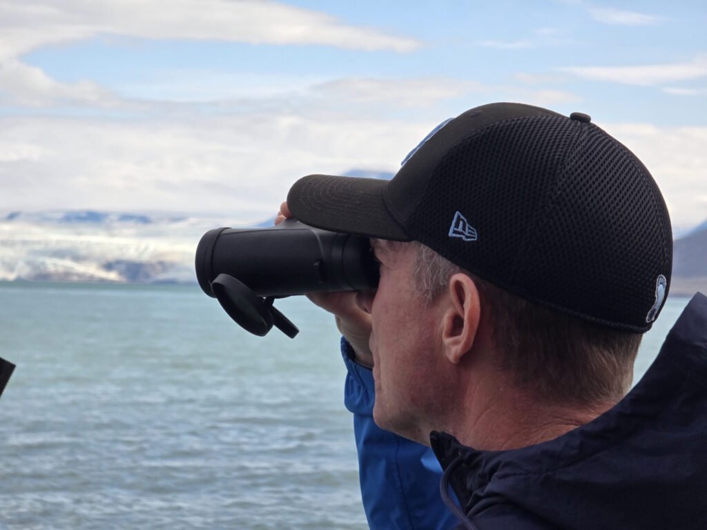 Looking for wildlife through binoculars