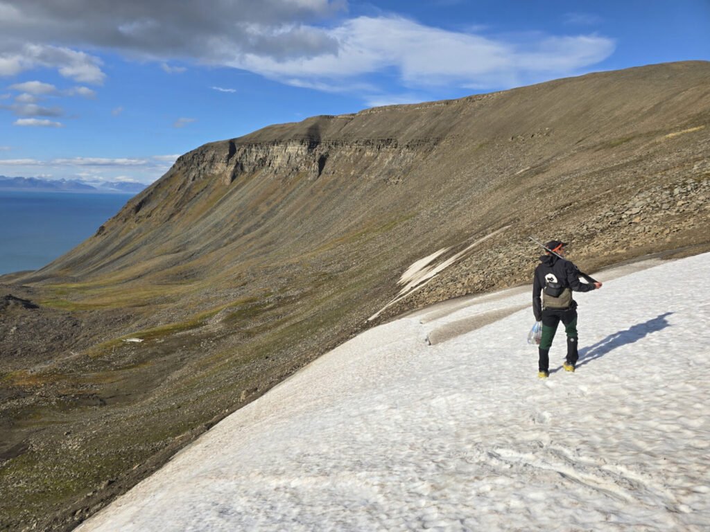 Hikers walking on snow and ice